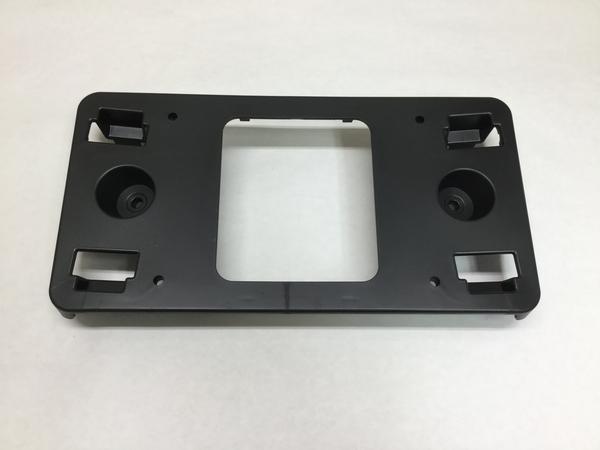 car without front licence plate bracket